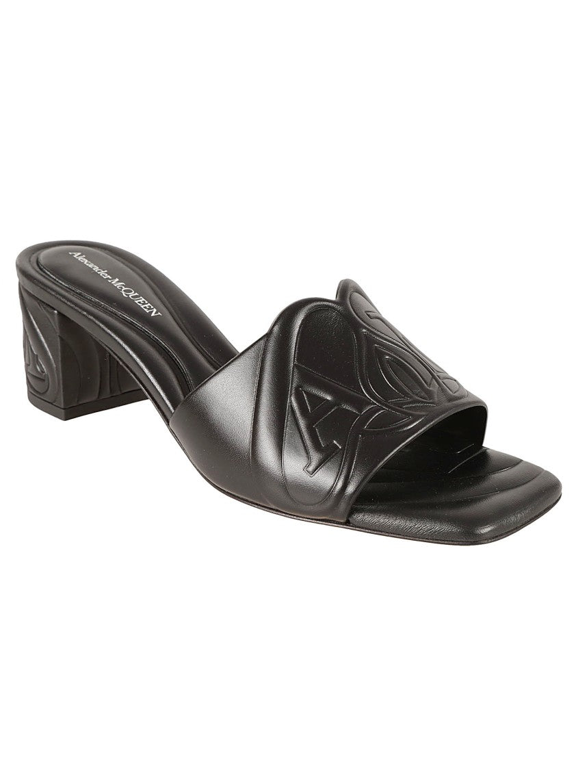 Alexander Mcqueen Black Heeled Mules With Embossed Detailing