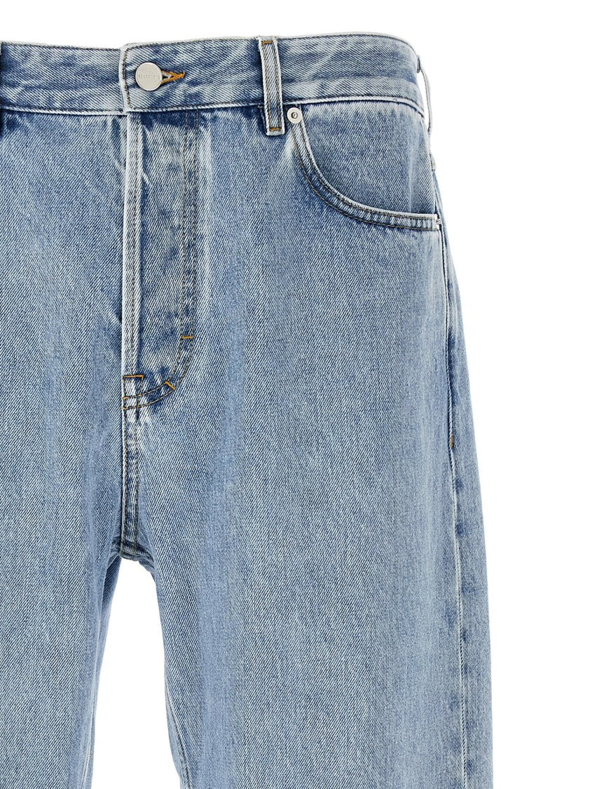 Gucci Bleached-Effect Denim Jeans With Signature Gg Inserts