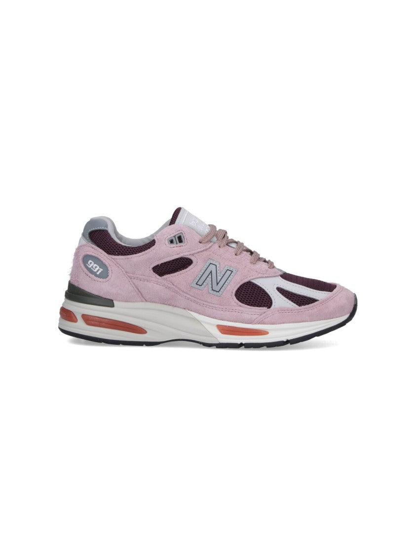 New Balance Suede And Mesh Sneakers With Iconic Branding And Textured Accents