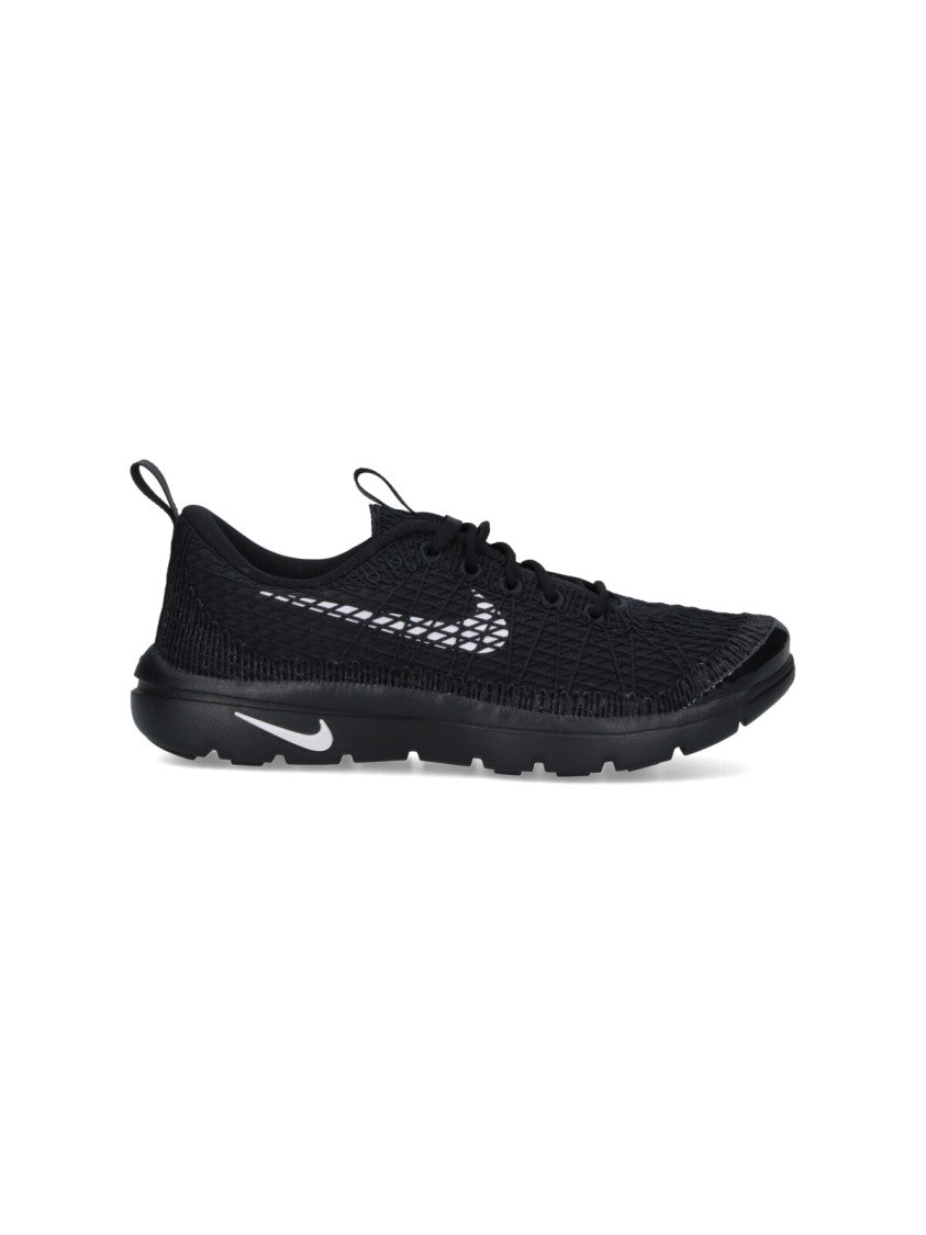 Comme Des Garçons Textured Black Sneakers With Low-Profile Design And Distinctive Branding