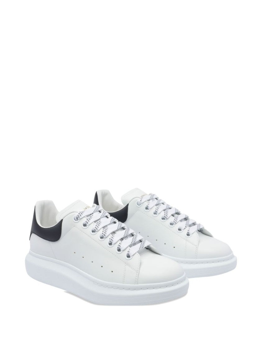 Alexander Mcqueen Minimalist White Leather Sneakers With Contrasting Heel Tab