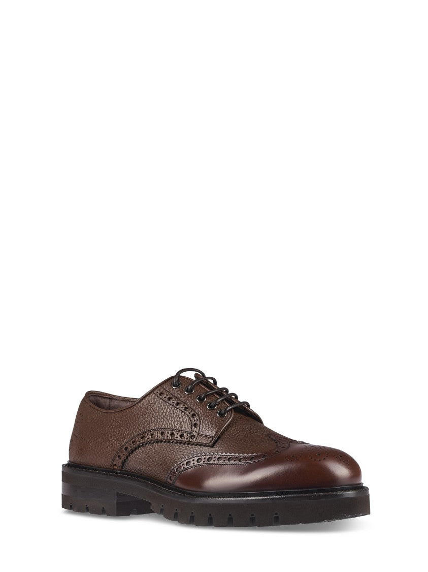 Ferragamo Brogue Leather Flat Shoes With Intricate Perforations