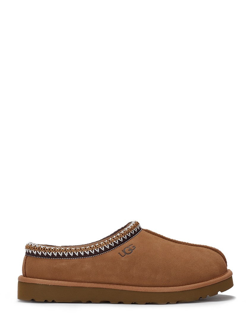 Ugg Ankle Boot With Plush Lining And Decorative Accents