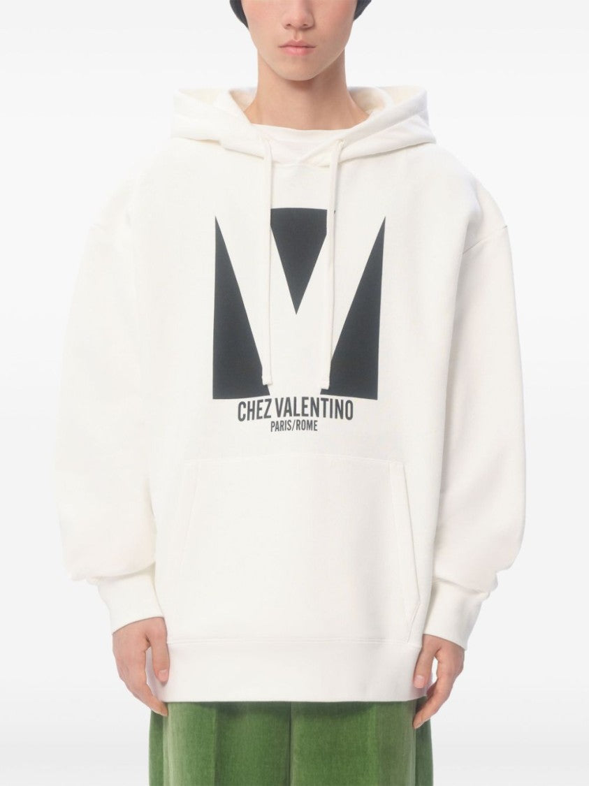Valentino Slouchy Cotton Jersey Hooded Sweatshirt With Logo Print