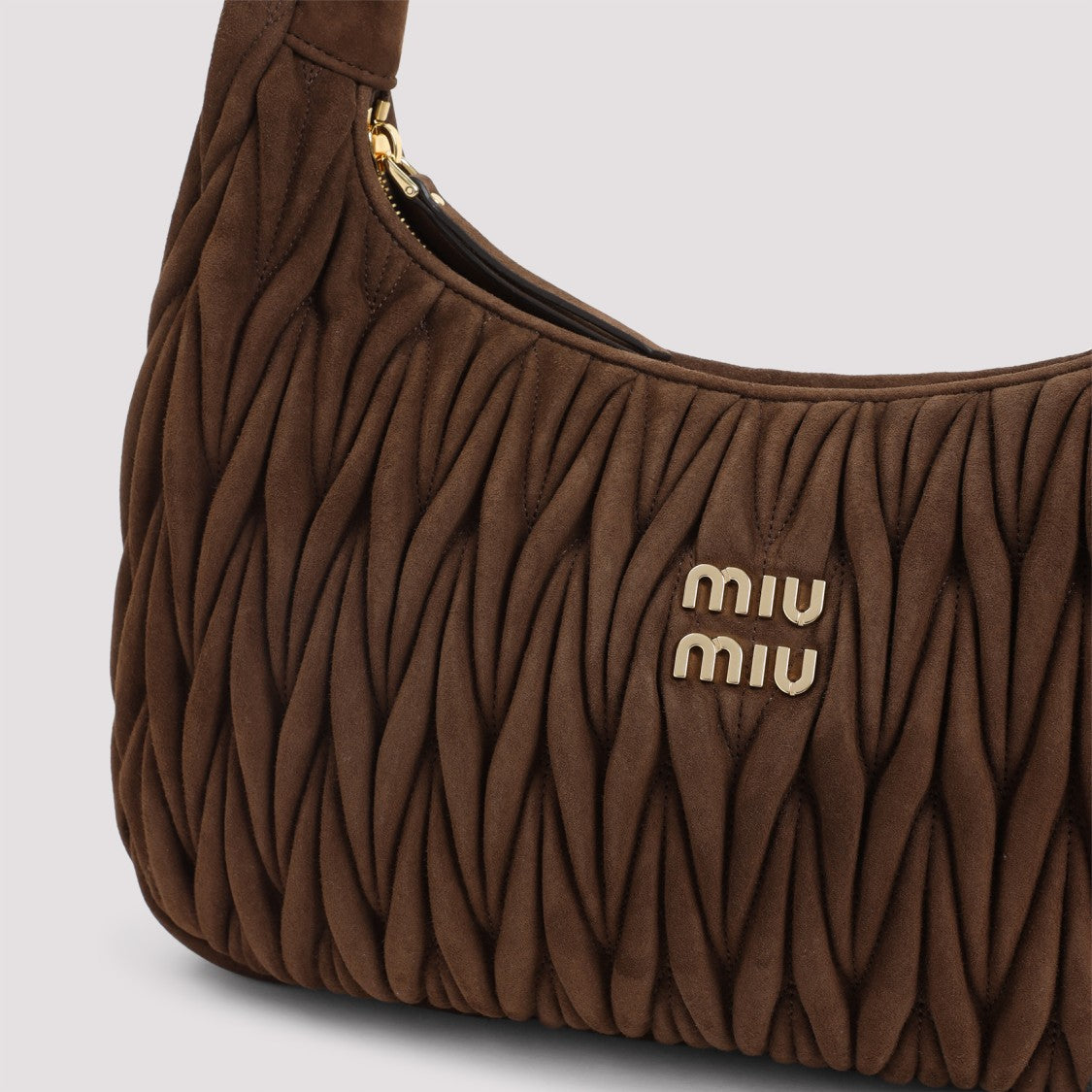 Miu Miu Quilted Suede Handbag With Spacious Interior