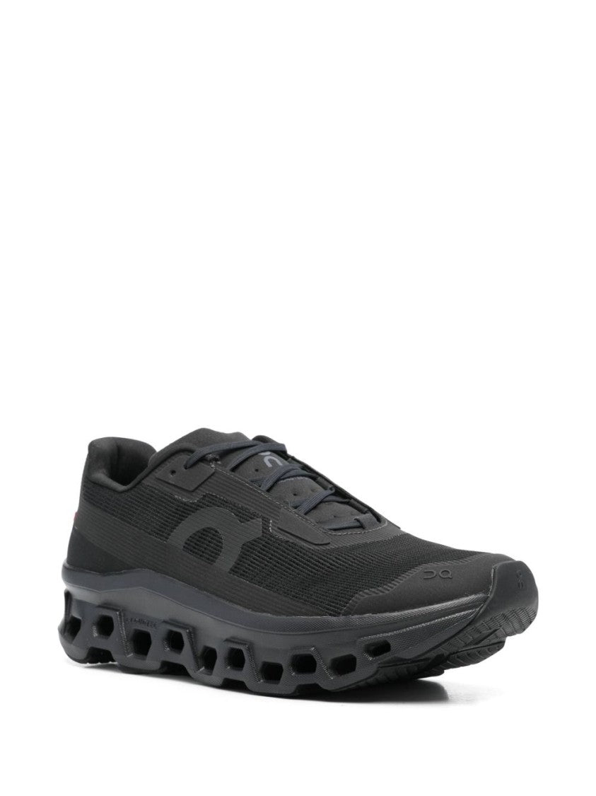 On All-Black On Sneakers With Hexagonal Cushioning Design