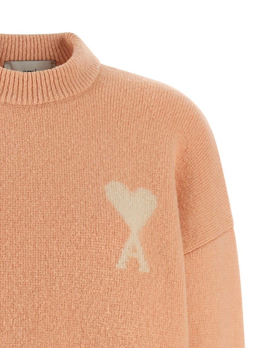 Ami Textured Knit Sweater With Classic Crew Neckline And Ribbed Details