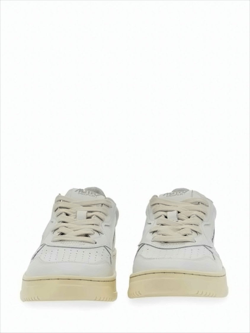 Autry Low-Top White Sneakers With Perforated Detailing And Metallic Accents