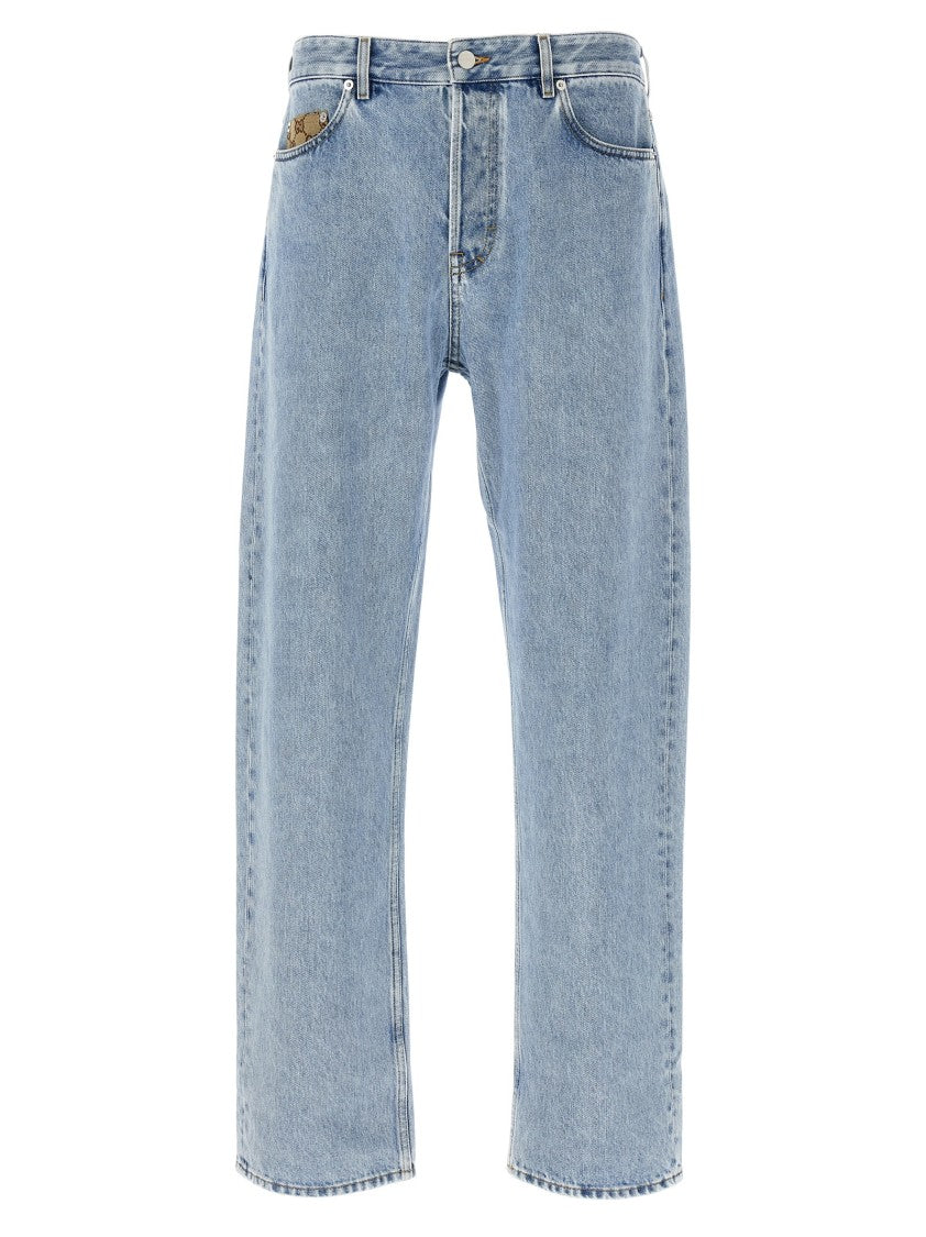 Gucci Bleached-Effect Denim Jeans With Signature Gg Inserts
