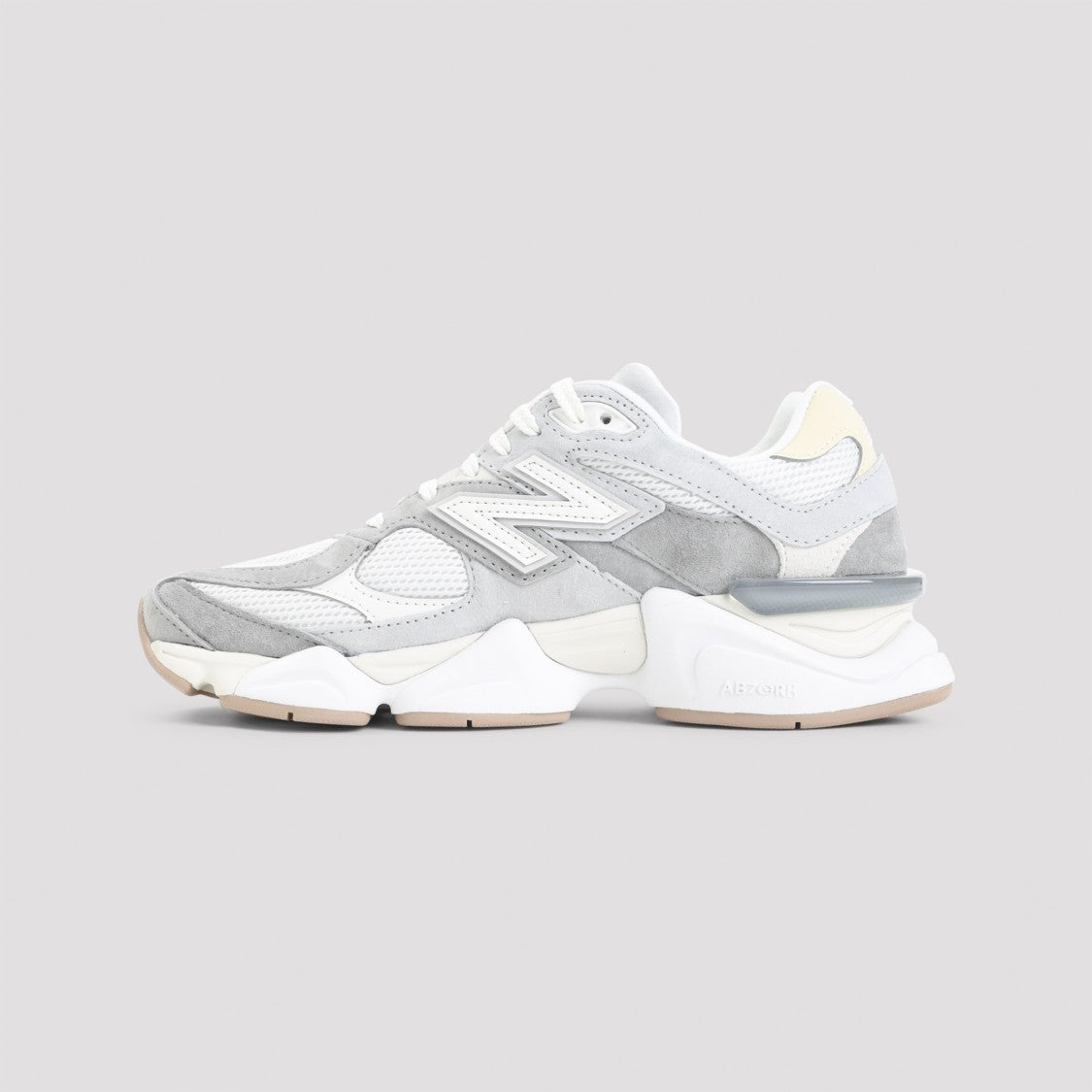 New Balance Layered Design Sneakers With Chunky Sole And Prominent Logo