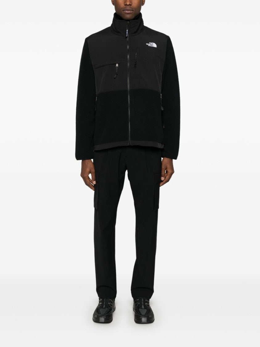 The North Face Textured Black Mid-Layer Jacket With Zip Pockets And Stand-Up Collar