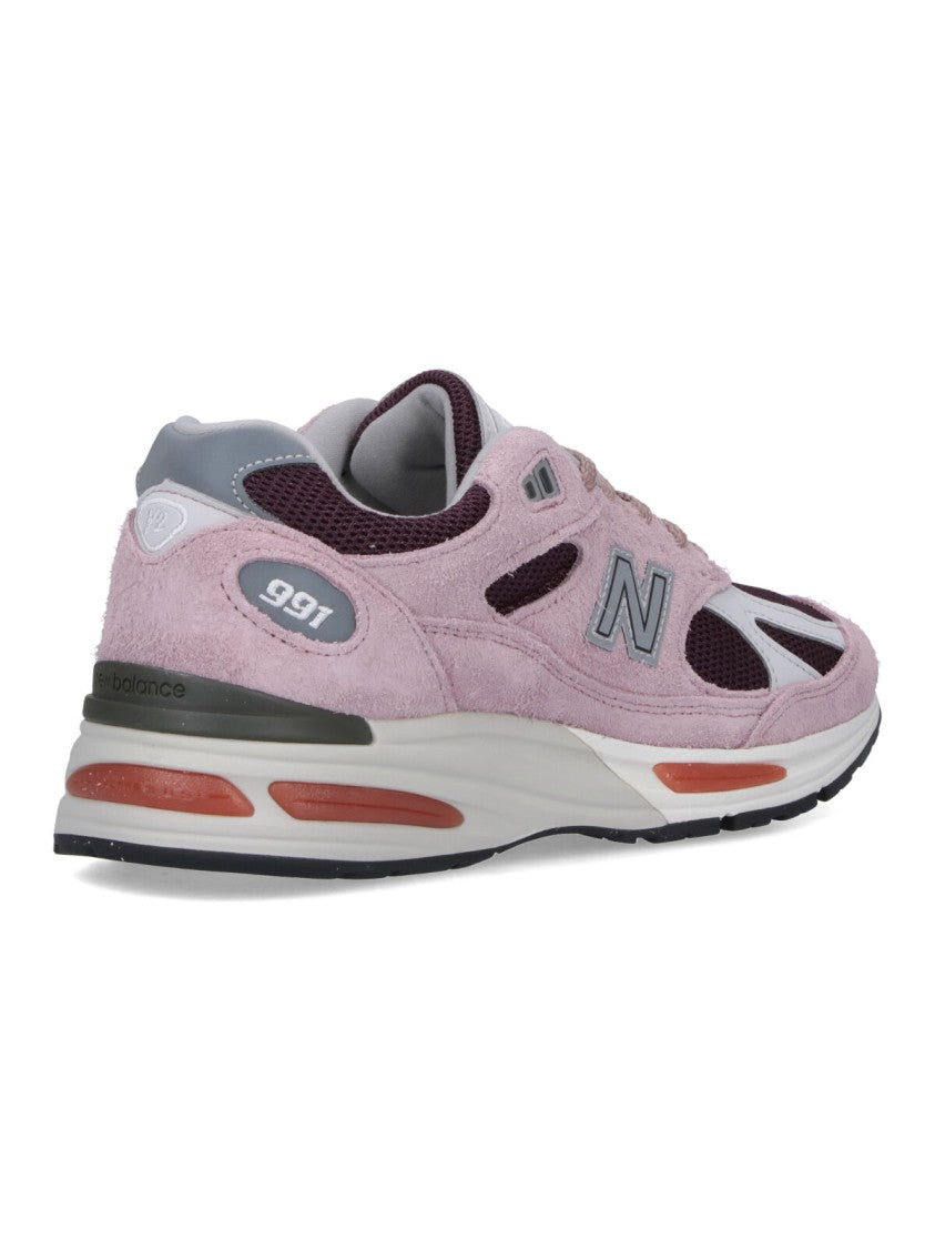 New Balance Suede And Mesh Sneakers With Iconic Branding And Textured Accents