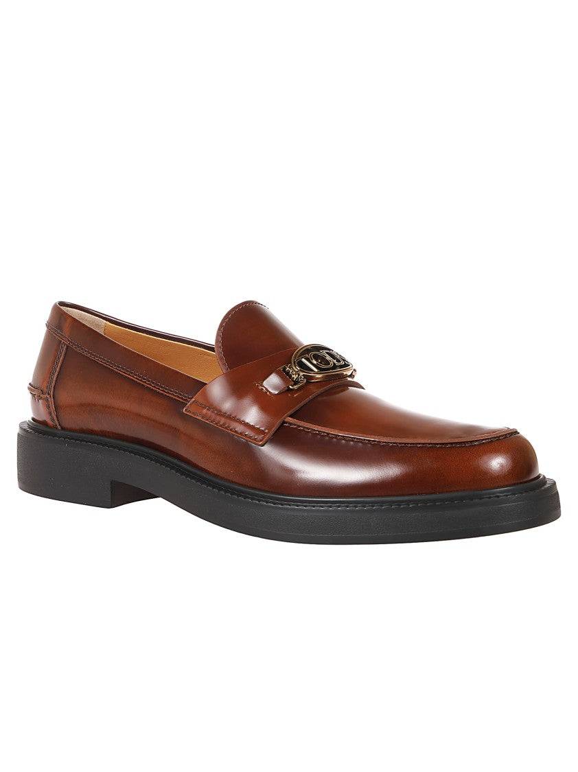 Tod's Moccasin Shoes With Decorative Emblem And Rubber Sole