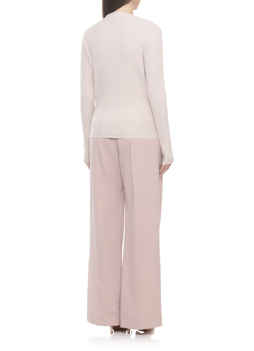 D. Exterior Pink Wool Sweater