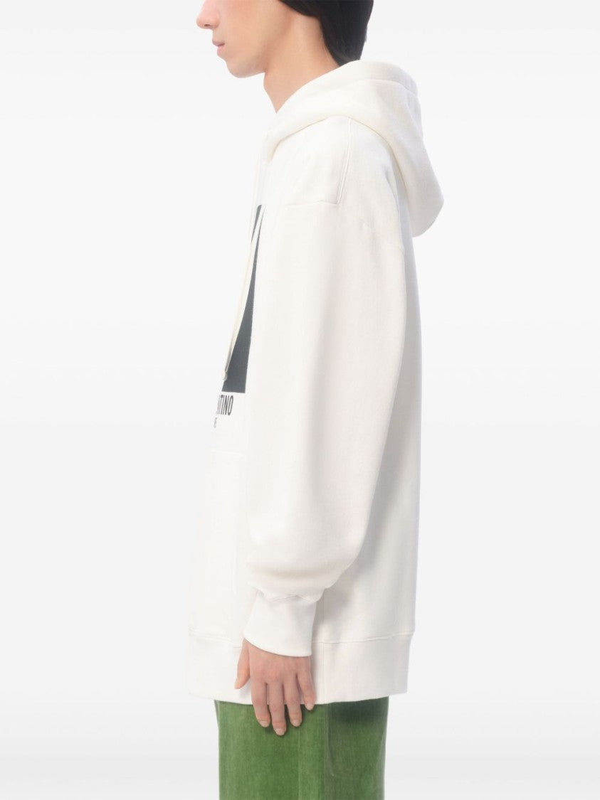 Valentino Slouchy Cotton Jersey Hooded Sweatshirt With Logo Print