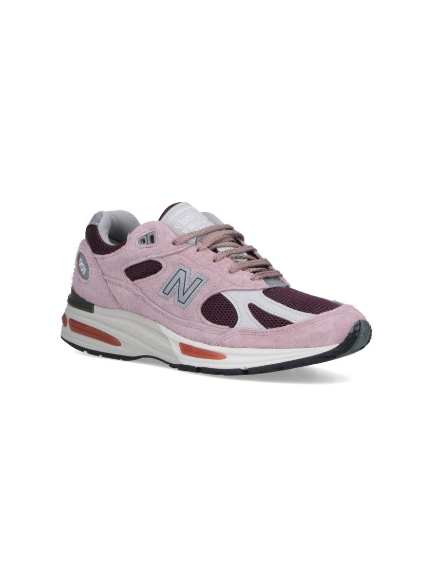 New Balance Suede And Mesh Sneakers With Iconic Branding And Textured Accents