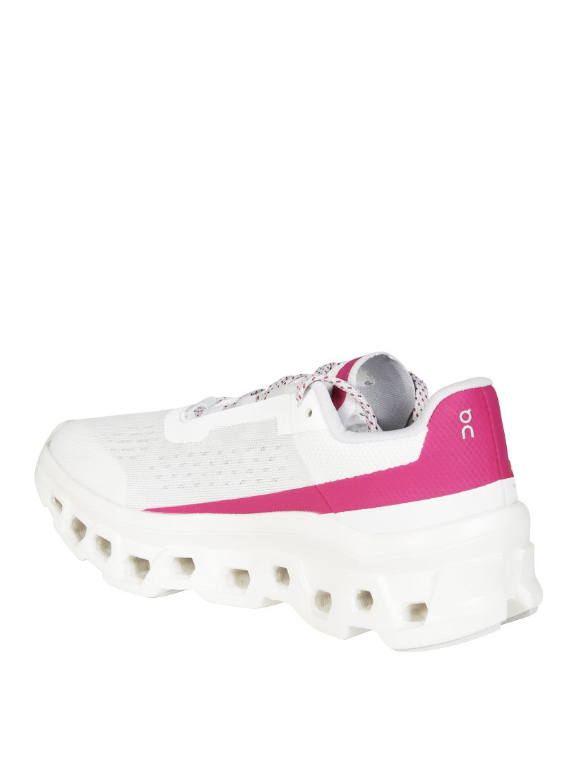 On Running Cloudmonster Sneakers With Sculpted Sole And Bold Accents
