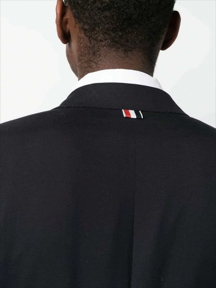 Thom Browne Sleek Tailored Suit Jacket With Notch Lapel And Metallic Buttons