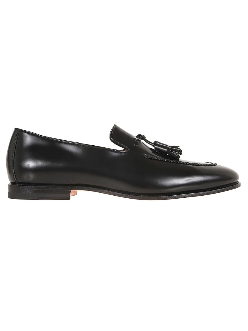 Santoni Black Leather Moccasin With Tapered Toe And Decorative Tassels